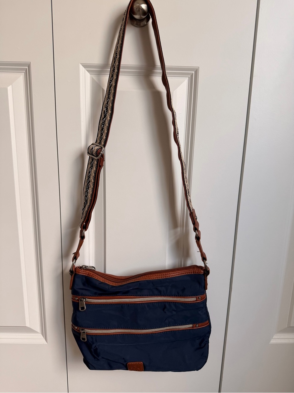 The Sak Navy Crossbody Bag with Brown Trim
